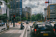 © Laura Herrera/Stocksy - Busy Crosswalk in Downtown Medellin