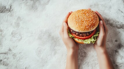Aufkleber - A person is holding a large burger that features fresh lettuce, tomato, and a thick patty, resting on a textured surface. Generative AI