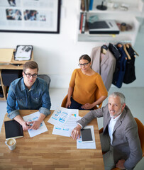 Aufkleber - Man, woman and documents with portrait in office for review, graphs or discussion with stats at fashion company. People, paperwork and above for team, charts or performance report with sales in Italy
