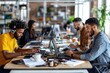 © Odin AI - A diverse group of professionals engages in focused work in an open-plan office, using laptops and headphones, embodying modern collaboration and productivity.