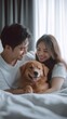 © Hailie - Happy Couple with Golden Retriever in Cozy Bedroom