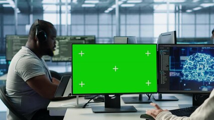 Poster - it support workers in ai data center coding on green screen computers, upgrading equipment. multieth