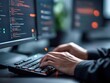 © praewpailyn - Close-up of hands typing on a keyboard in front of multiple screens displaying code and programming data, showcasing a modern tech workspace with a focus on software development.