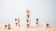 © phimprapha - glowing light bulb on top of cube block in question mark. problem solving concept.