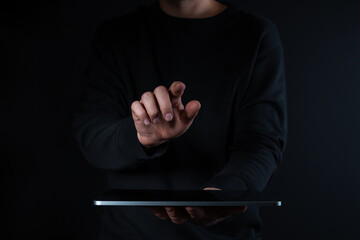 Poster - Man hand and finger touch something holding tablet