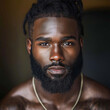 © malik - Muscular man with intense gaze and tousled hair.Portrait of black confident sportsman. Handsome muscular male athlete, african american bodybuilder looking at camera.