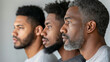 © malik - A side view close-up shot group of Black men in their late thirties standing next to each other.