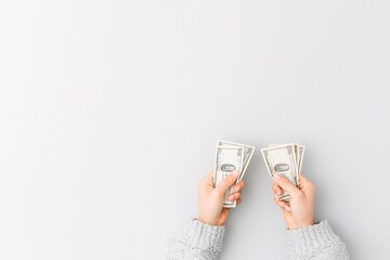 Poster - Two hands holding receipts with different totals, symbolizing a price and value comparison, with ample copy space for branding or text.