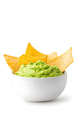 Bowl of guacamole with tortilla chips, isolated on white background