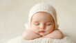 © iDoPixBox - A baby is sleeping in a white hat