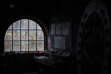 A former old smith's workshop with a big window.