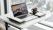 © AiPhotoSale - The workspace features a modern laptop, a steaming coffee mug, and an open notebook, all arranged neatly on a crisp white desk bathed in warm, natural lighting, creating an inviting atmosphere.