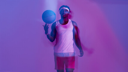 Poster - Portrait, basketball and black man with neon lights, sports and confident guy on studio background. African person, model and player with fitness, exercise and training with pride, skills and hobby
