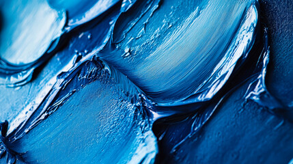 Poster - rich blue paint swirls on canvas, highlighting the texture and movement of the brushwork, conveying depth and creativity