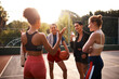© peopleimages.com - Group, women and discussion for basketball, outdoor and energy for sport, friends and together with ball. Fitness, conversation and team in weekend, training and practice for competition and people