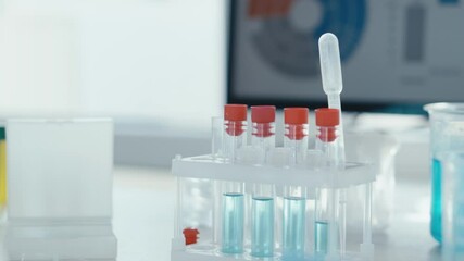 Fototapete - Laboratory analysis utilizing test tubes and pipettes plays an essential role in the modern research setup, contributing significantly to various fields of study such as biology and healthcare