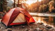 © Natalia - Installed tourist tent and a camping lantern in naturenear river.