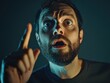 © Alexandr - Surprised expression on man's face, pointing hand towards camera.