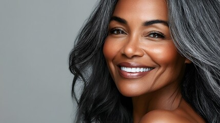 Wall Mural - Beautiful black mature woman with smooth healthy face skin