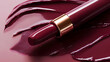 © Naseem - Elegant Burgundy Lipstick Tube Displayed on a Shiny Surface with a Bold Color Swipe-