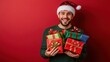 © Joyce - Happy man with gift box in holiday season.