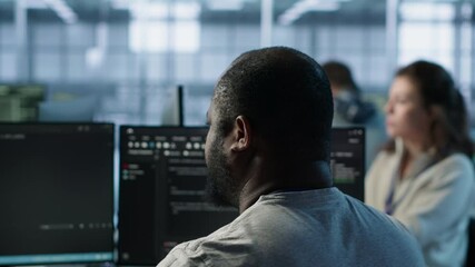 Poster - system administrator working in computer network security data center listening music. african ameri