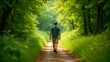 © Tamas - A Solitary Man Walking Along a Scenic Nature Path Surrounded by Lush Greenery and Vibrant Colors