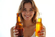 © PTD - woman holding two bottles of beer, smiling brightly with cheerful expression. background is bright and minimalistic, emphasizing her joyful demeanor