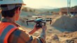 © ArtPro - Surveyor using a drone and tripod-mounted camera for construction inspection.