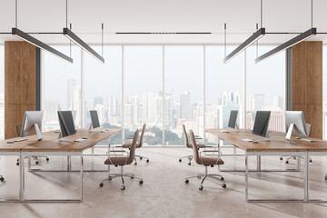 Poster - Spacious modern office with wooden desks and computers, cityscape view through large windows, minimalist style. 3D Rendering