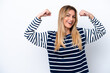 © luismolinero - Young Uruguayan woman isolated on white background doing strong gesture