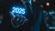 © jamal - Businessman holding growth graph a year 2025 of business and data analysis. Development to success in year 2025