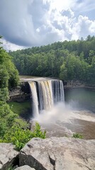 Poster - Cumberland Falls cascading majestically amidst lush greenery on a sunny day