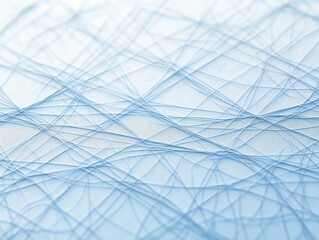 Poster - Intertwined light blue threads create an intricate pattern on a pale blue background, evoking a sense of calm and elegance
