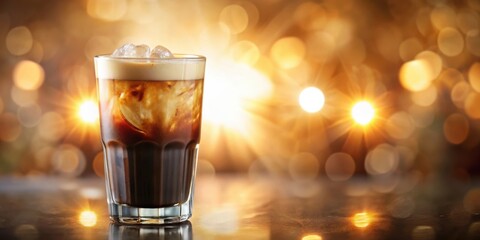 Aufkleber - A Cold Refreshment with Ice Cubes and a Frothy Top, Captured Against a Warm Golden Bokeh Background