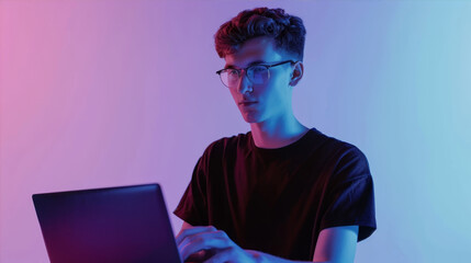 Man with laptop on purple  background
