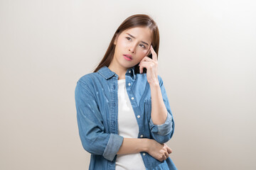 Sticker - Portrait of face expression stress, asian young woman, confused girl standing pose looking away in casual. unhappy female thinking creative, thinks about problem, isolated on background, copy space.