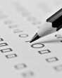 © Nei Mar - Close-up of pencil marking multiple-choice exam answers.