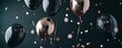 © JBMotillon - Ballons flottants noirs et or rose avec paillettes scintillantes dans l'obscurité.