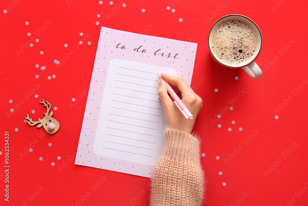 Blank to-do list with Christmas decor on red background