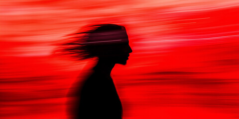 Poster - Silhouette of woman moving fast with long hair blowing in wind on red abstract background