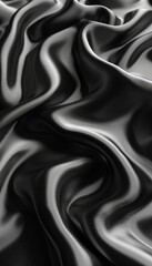 Poster - Soft satin fabric in shades of black and silver creates a flowing texture, highlighting the delicate interplay of light and shadow. The material cascades in graceful curves, inviting touch.