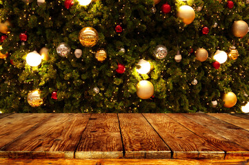 Wall Mural - christmas tree background with empty wooden deck table. empty display for product montage design.