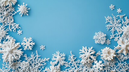 Poster - Sparkling snowflakes on a gradient blue background, open space for seasonal messages