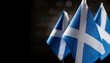 © ochikosan - 小さなスコットランドの国旗と暗い背景。(Scotland flag and dark background.)