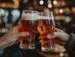 © Pravinrus - Focus shot of clinking glasses with beer