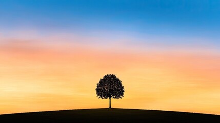 Poster - Lone tree silhouette against a vibrant sunset sky, peaceful and serene.