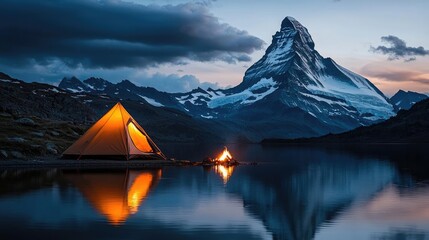 Wall Mural - tent by lake with mountain reflection at dusk.