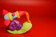© Станислав  - A toy snail made of plasticine with a rocket. Science and technology.