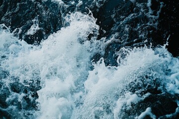 Poster - Vibrant splashing water, captured with dynamic flow rhythm, creates an energizing visual portraying nature's power and beauty as an endless dance of water.